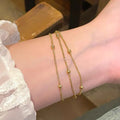 Triple-Strand Gold Ball Bracelet