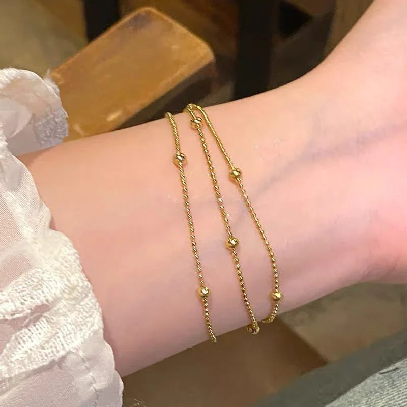 Triple-Strand Gold Ball Bracelet