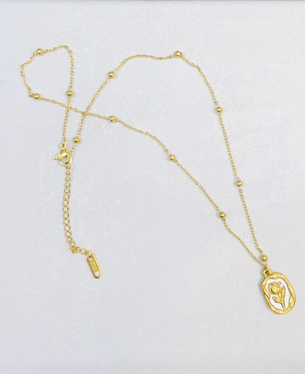 Gold Ribbon Bow Neclace with Pearl Drop