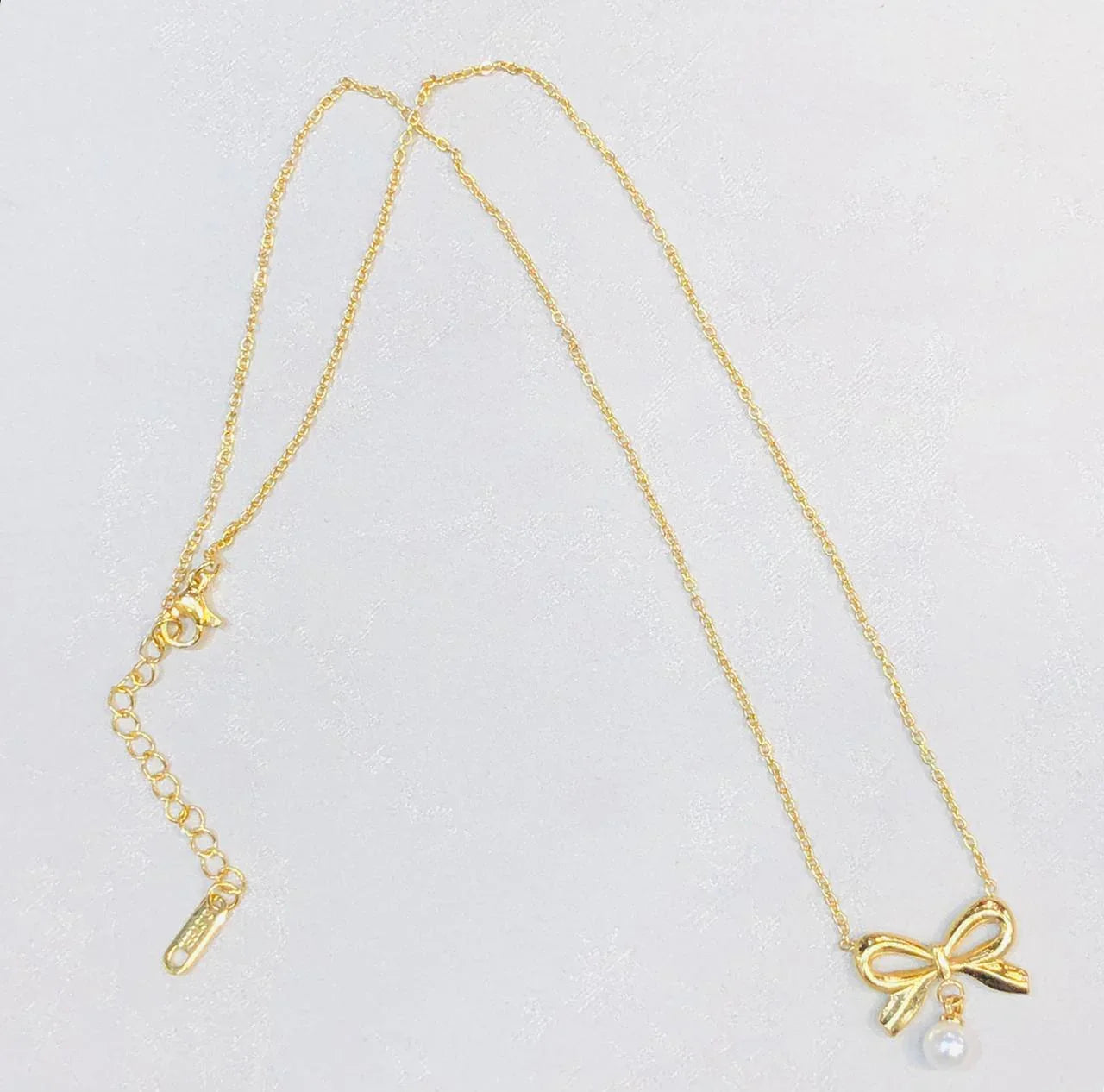 Gold Ribbon Bow Neclace with Pearl Drop